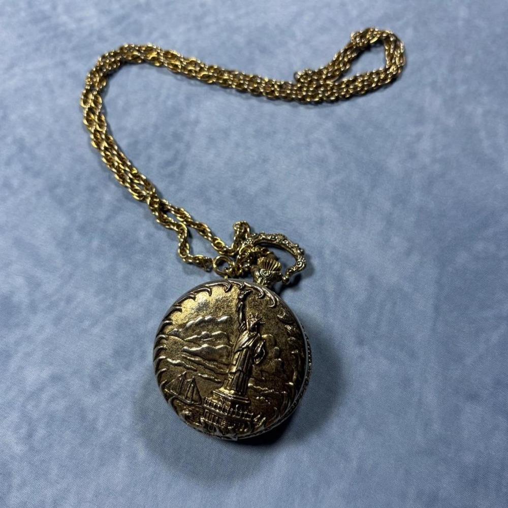 Gold quartz vintage Lady Liberty/ America style pocket watch with chain